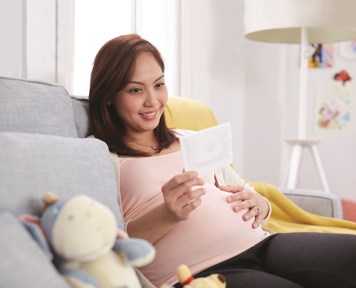 happy mother reading